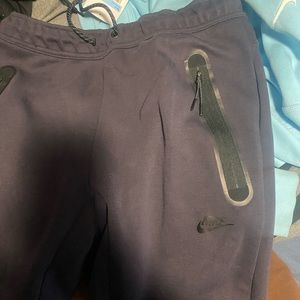 Purple nike tech pants